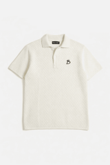 White polo shirt with a small logo on a white background